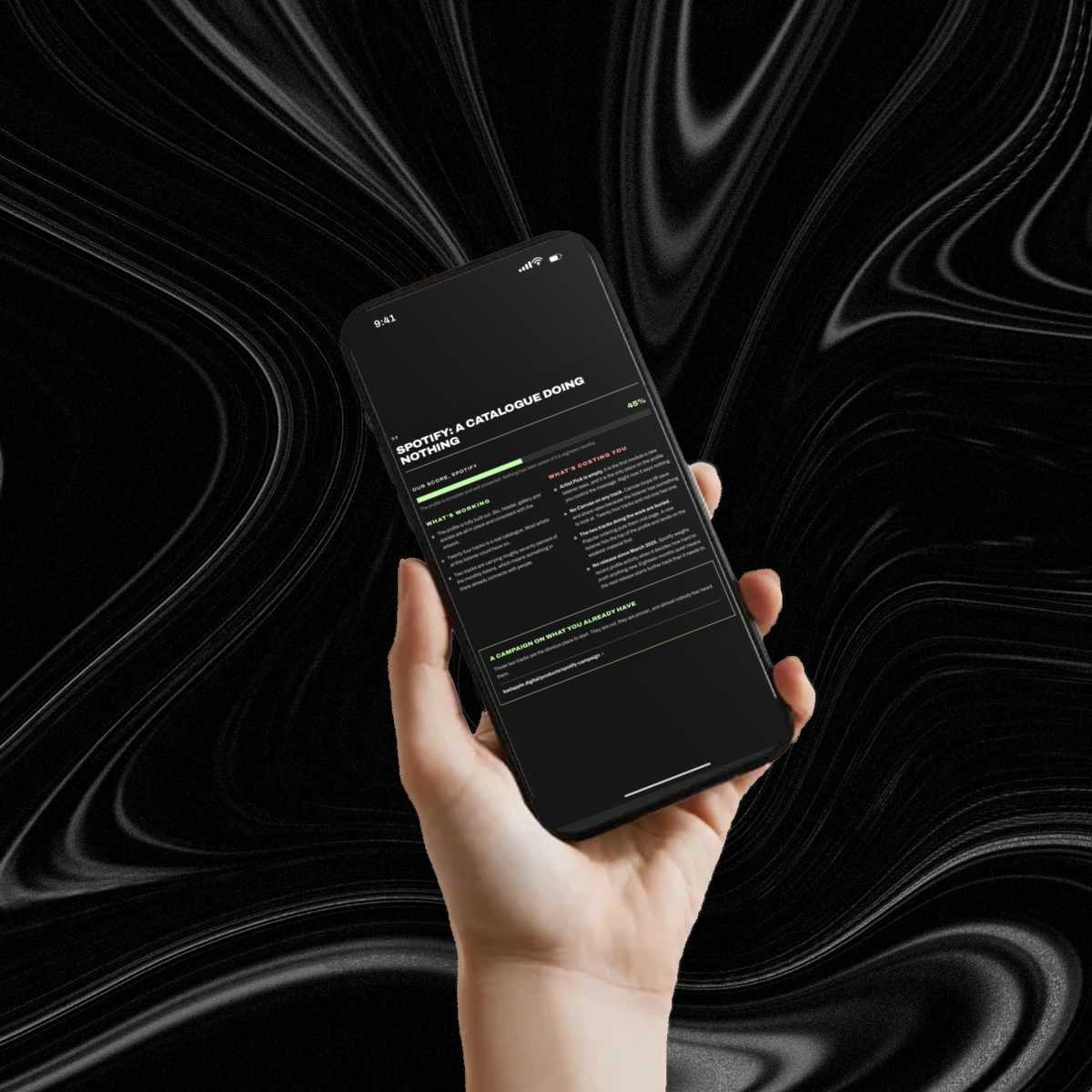A Bad Apple Artist Audit open on a phone, held against a black marbled background