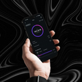 Instagram insights showing 191,919 views on a phone, held against a black marbled background